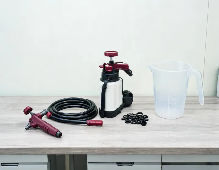 Nozzle and pump components prepared for a sprayer comparison